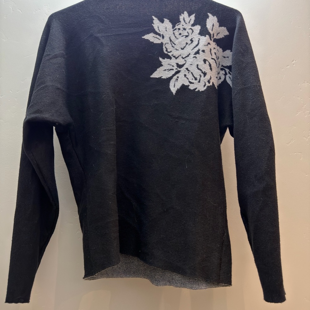 Black Sweater with White Floral‎ Design